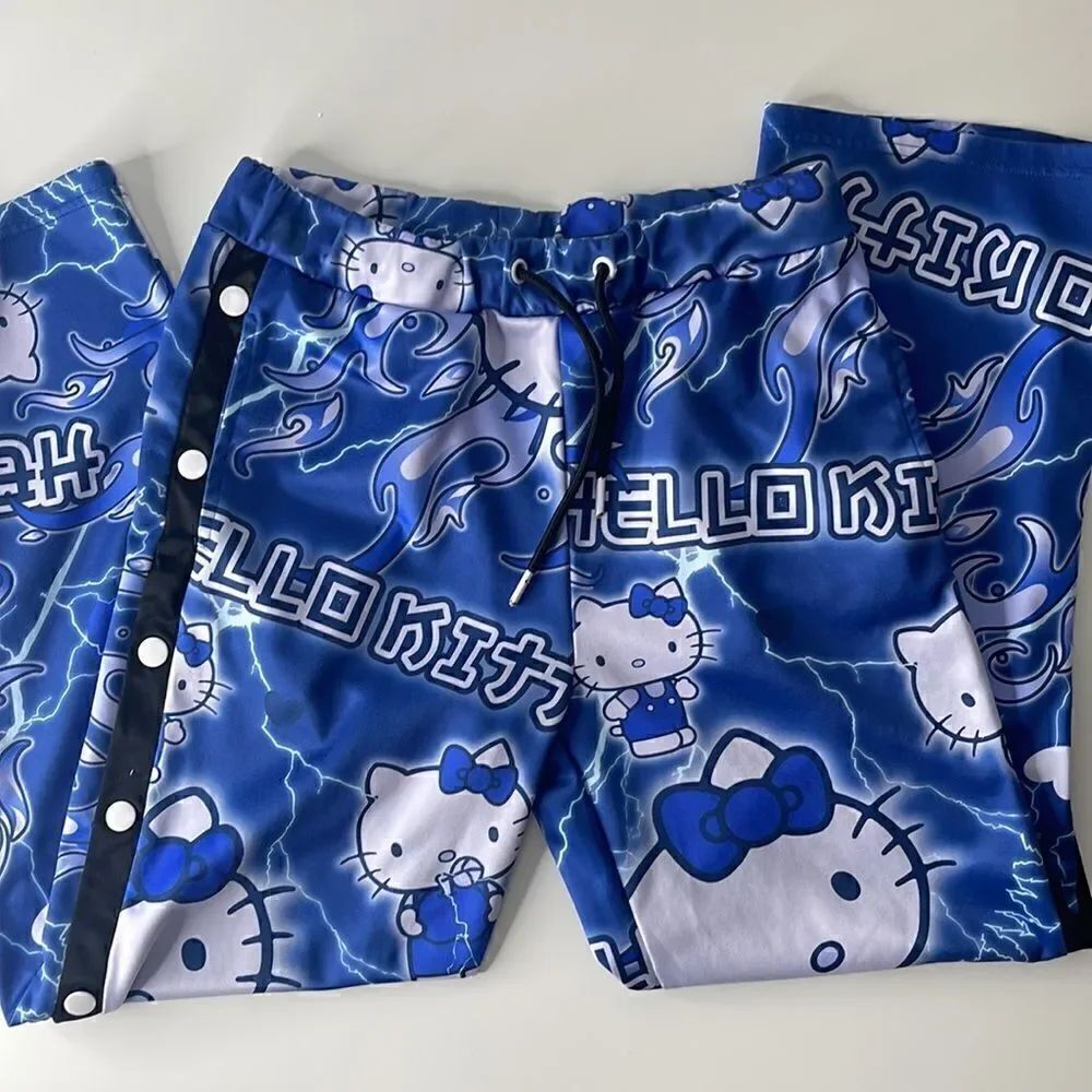 Hello Kitty Jimmy Paul sweatpants. Size small. Drawstring waist. Snap up legs.